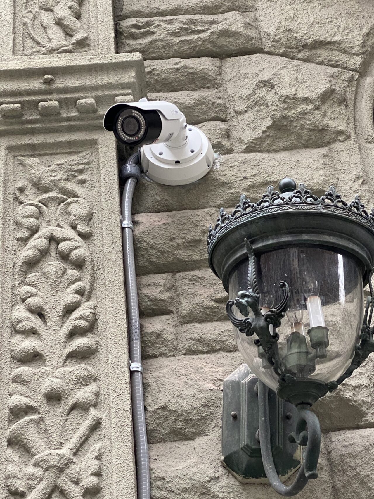 Security Camera Installation on Historic Stone Building, Upper West Side
