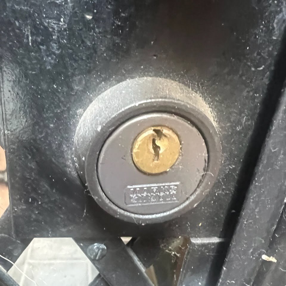 Deadbolt cylinder installed on a metal security door, Metro Local Locksmith