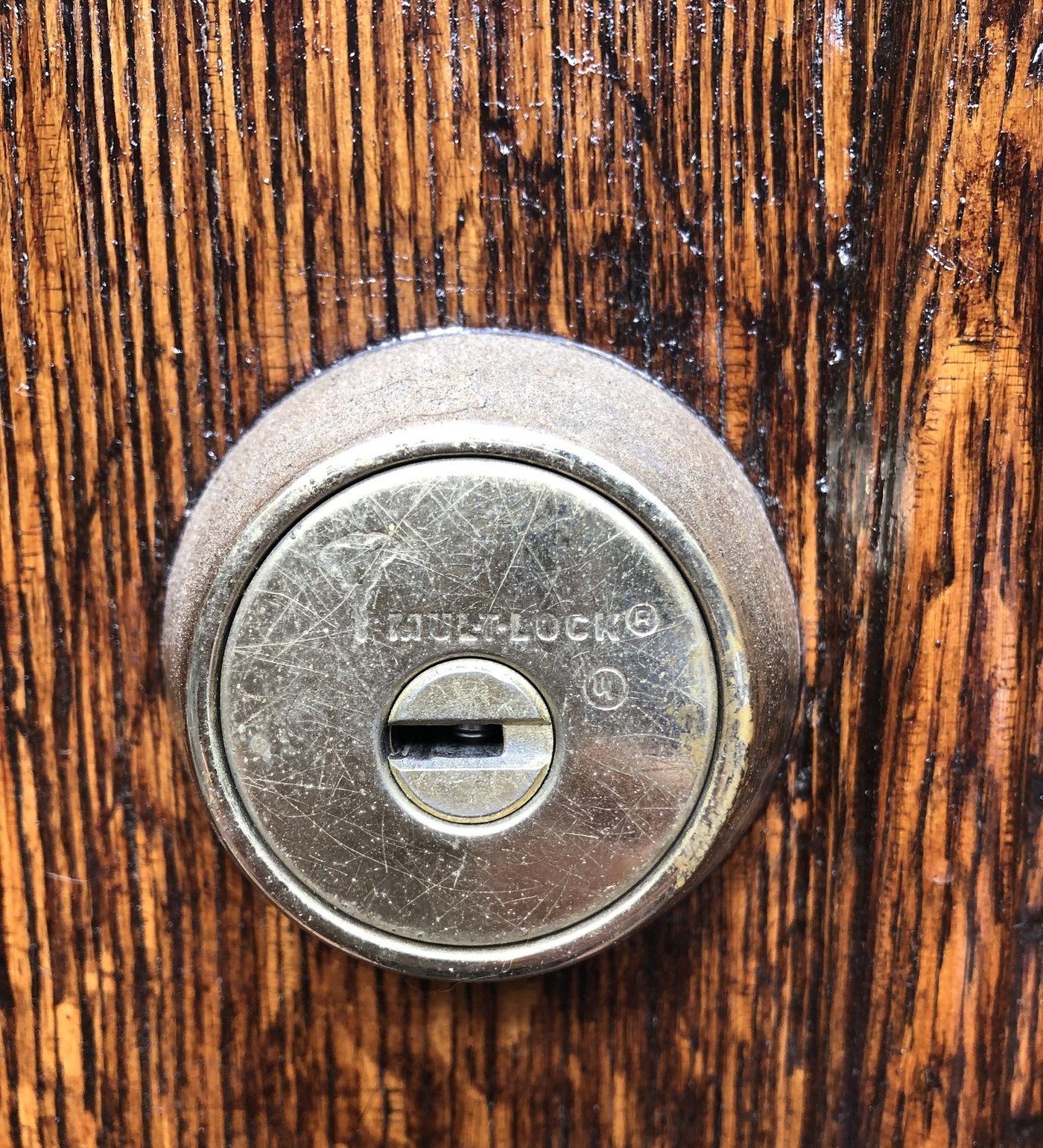 Mul-T-Lock high-security deadbolt on a wood entry door, installed by Metro Local Locksmith, NYC
