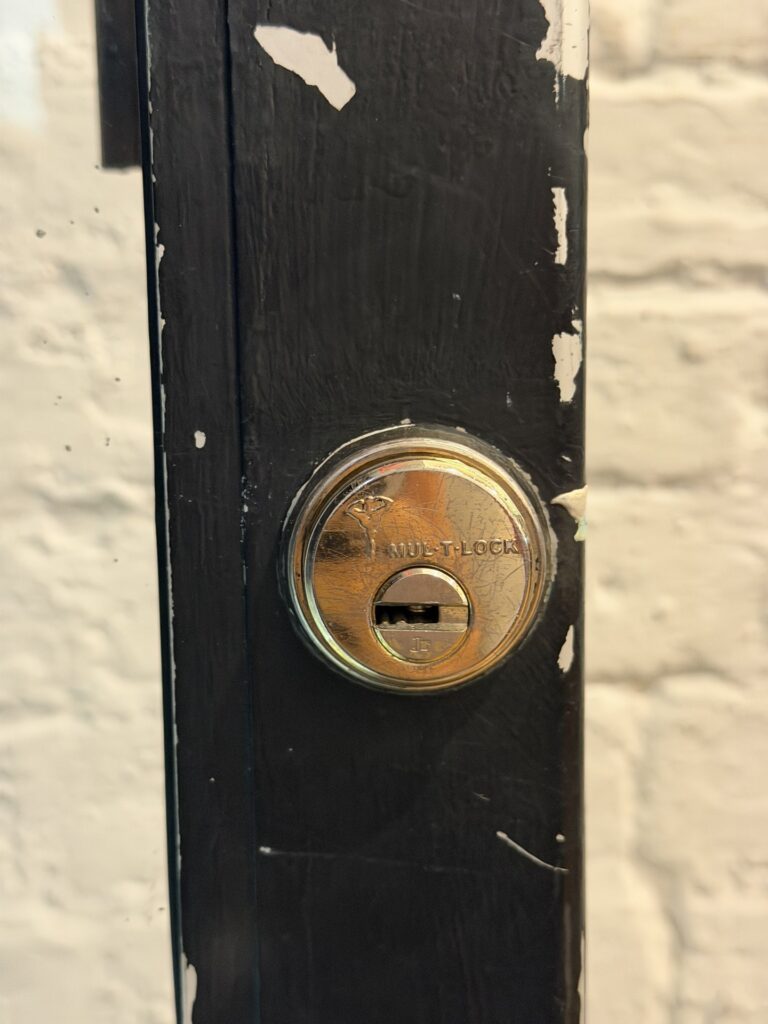High-security restricted Mul-T-Lock cylinder close-up, installed by Metro Local Locksmith on the Upper East Side, Manhattan