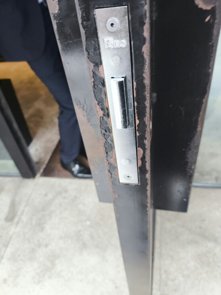 Faceplate of a narrow-style European mortise lockset matched to the existing case size, installed by Metro Local Locksmith on the Upper East Side, Manhattan
